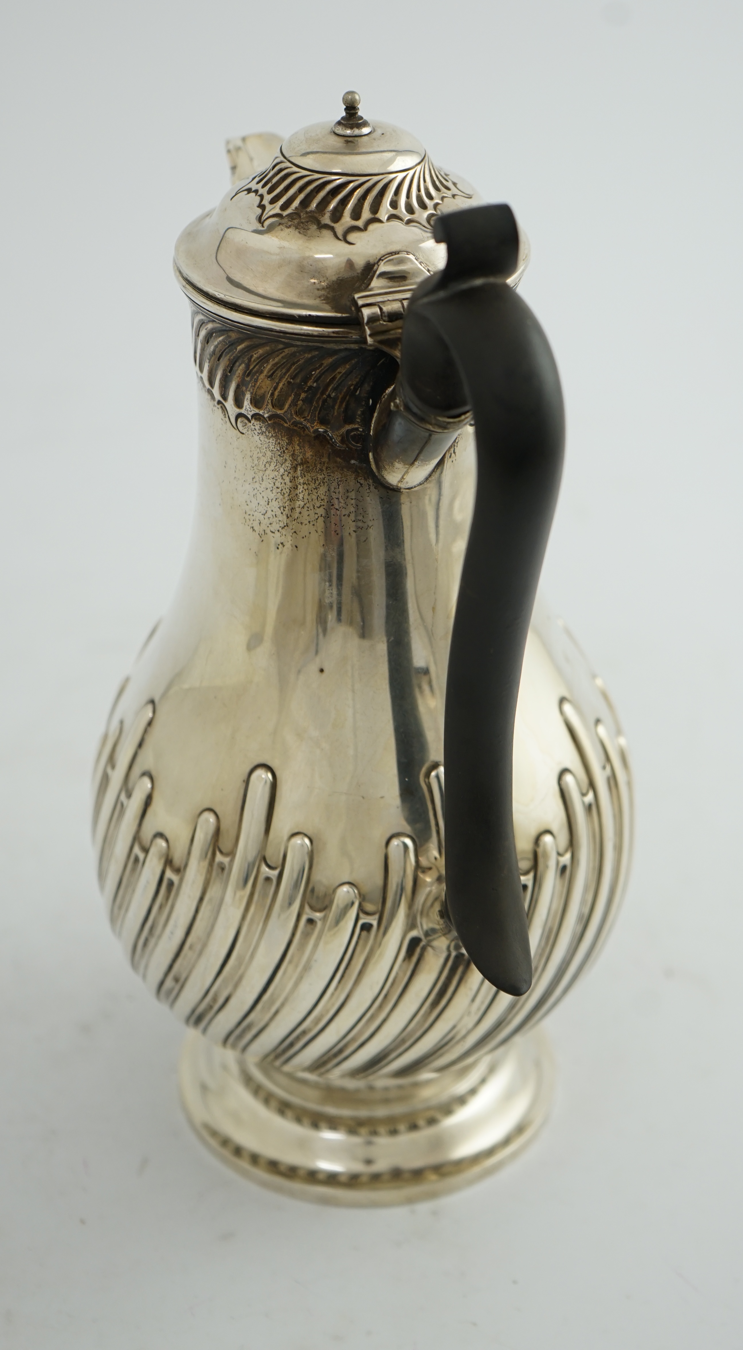 A late Victorian demi-spiral fluted hot water pot, by James Deakin & Sons Ltd